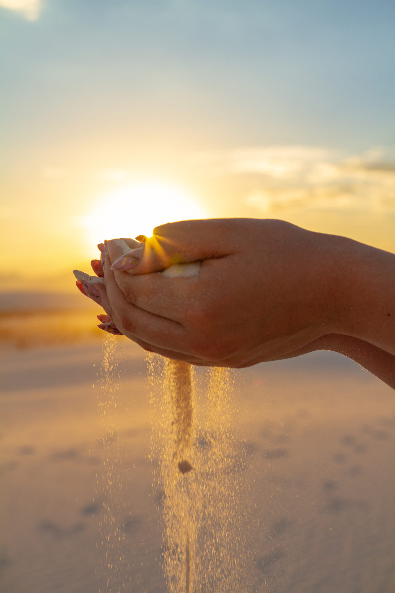 Person Holding Sand